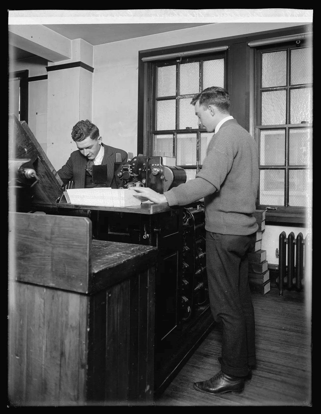 Two people operating Census tabulating machines
